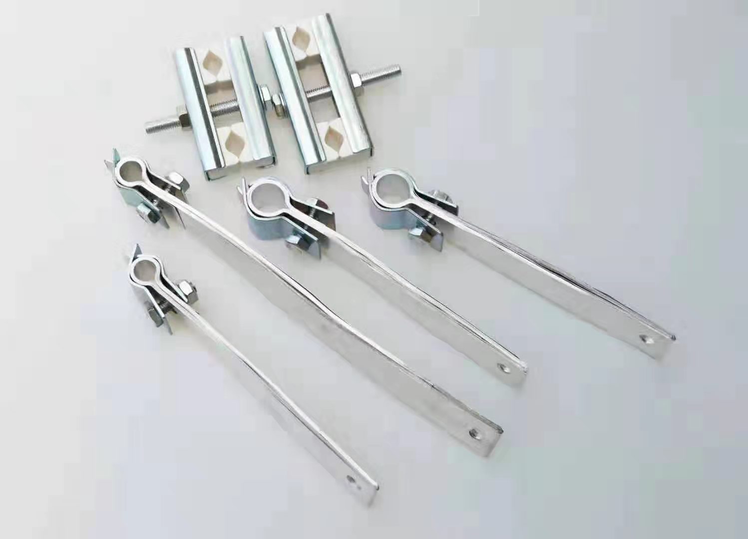 Terminal clamps and ceramic blocks